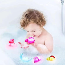 Load image into Gallery viewer, Glowing Dinosaur Shaped Bath Toy